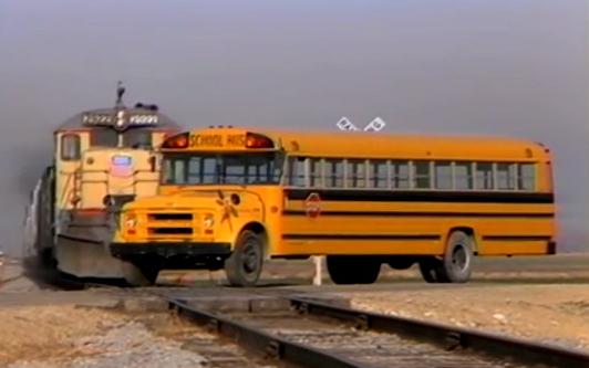 9 feared dead in school bus-train collision