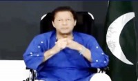 'I was hit by four bullets': Wheelchair-bound Imran Khan with leg in cast makes first video address since attack