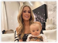 Paris Hilton is enjoying her baby's first trip to New York City, check out her images
